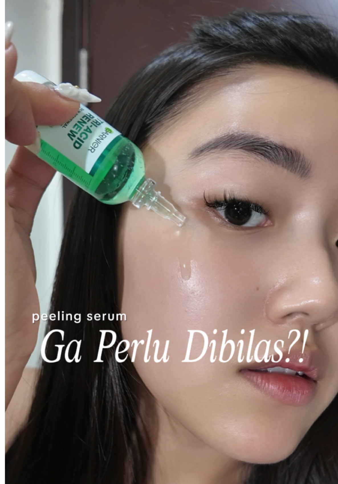 TikTok post by @mizypage for Garnier Indonesia. Caption reads: peeling serum ga perlu dibilas?!inovasi apa lagi....