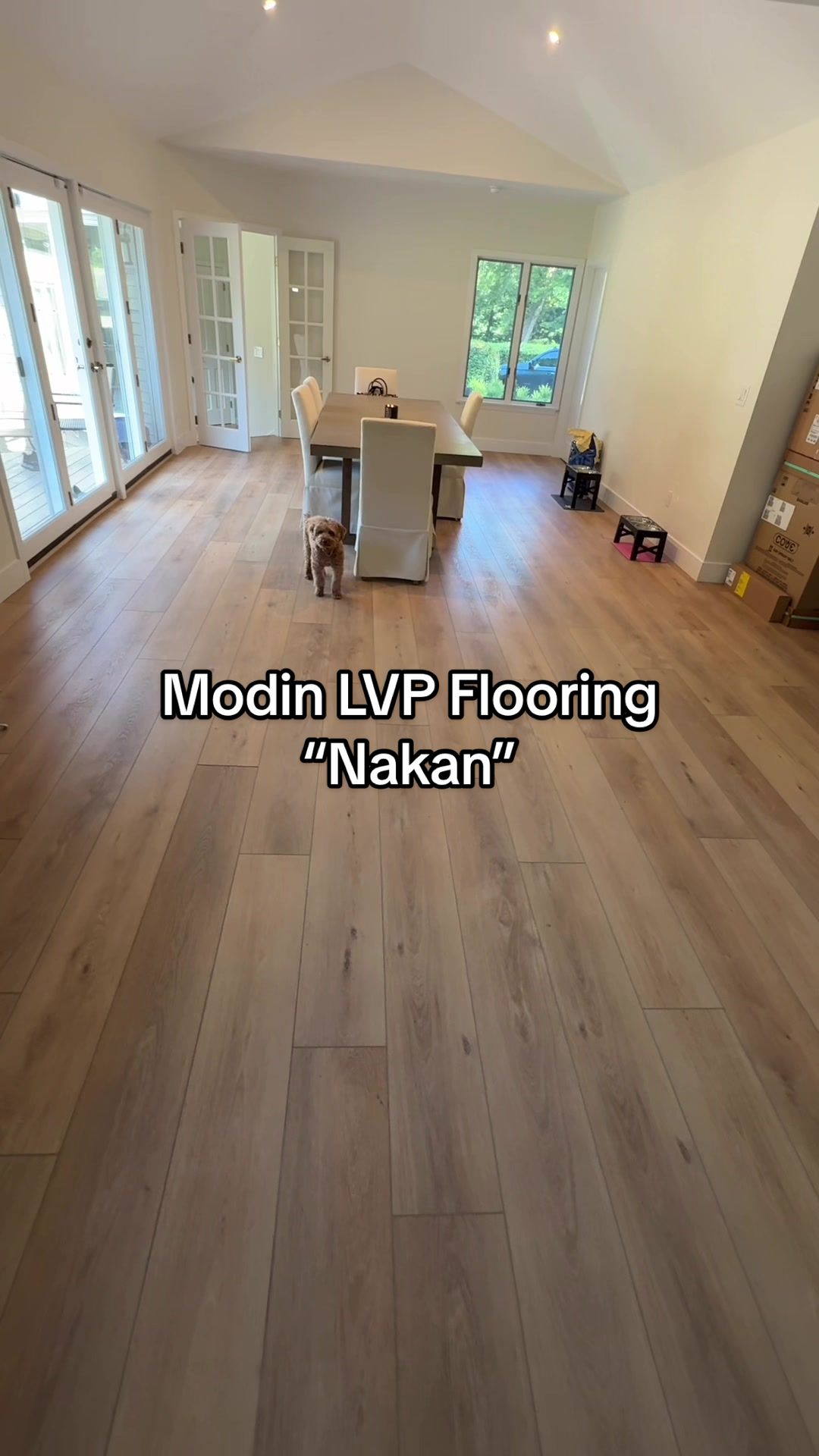 TikTok post by @mandysacs for Flooret. Caption reads: [...] our new Modin LVP Flooring from @shopflooret....