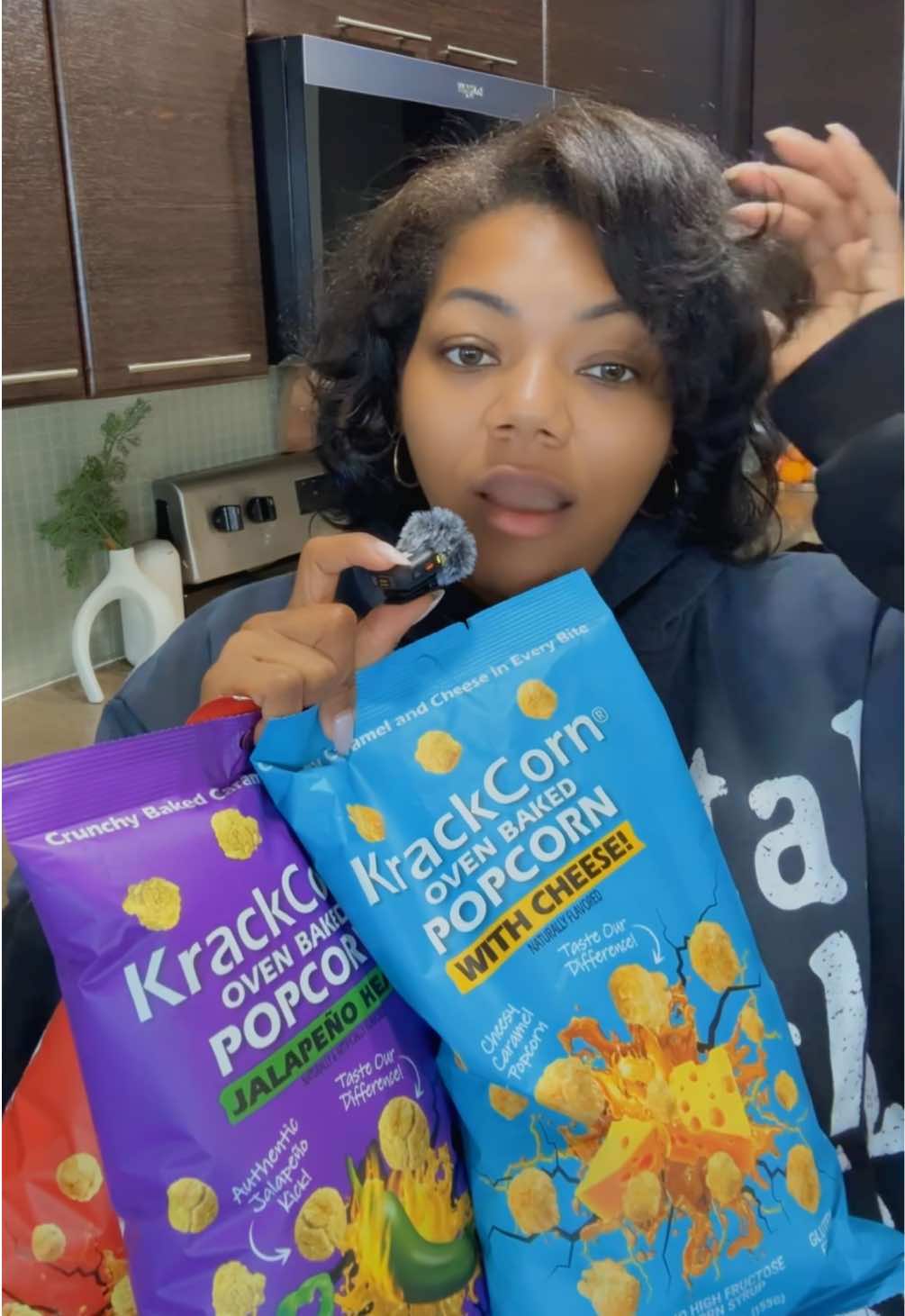 TikTok post by @ladietiktokshop for KrackCorn Popcorn. Caption reads: The best popcorn 🍿 @KrackCorn Popcorn.