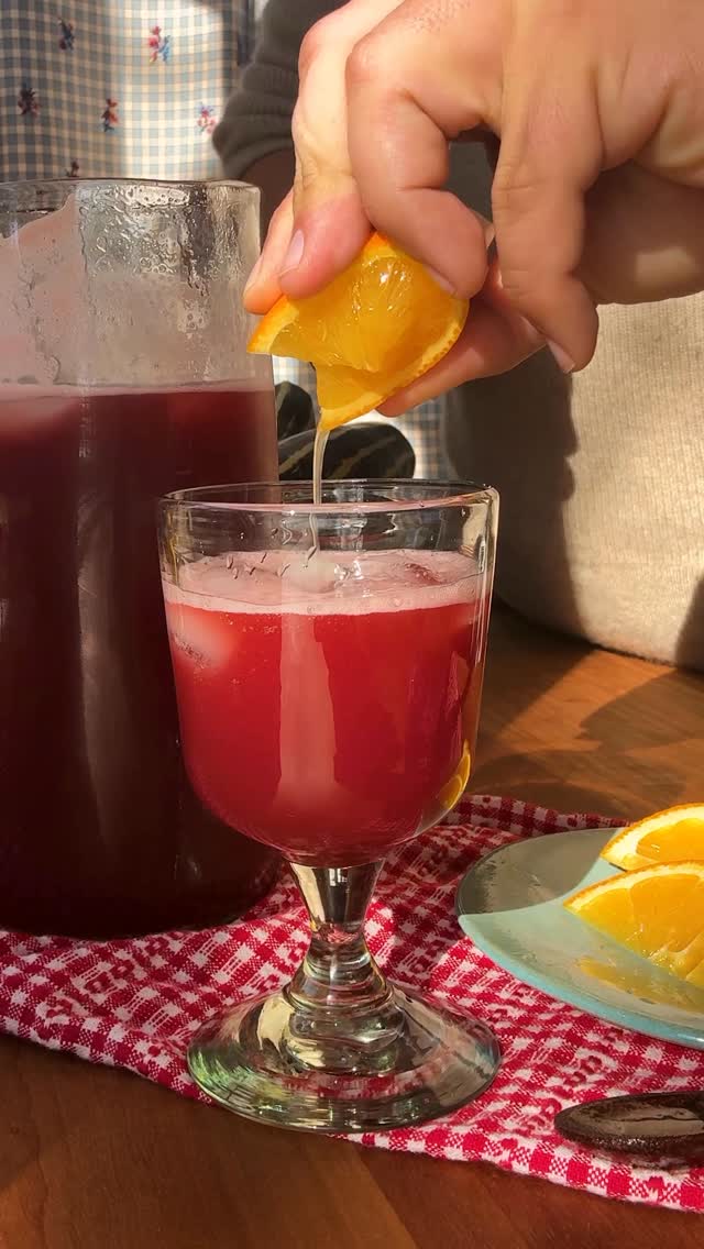 Instagram post by @grossypelosi for NYT Cooking. Caption reads: Nonna’s Negroni is my homemade NA Negroni recipe....