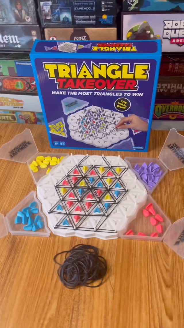 Instagram post by @tiktokboardgames for What Do You Meme. Caption reads: Chinese Checkers + Dots and Boxes = Triangle....