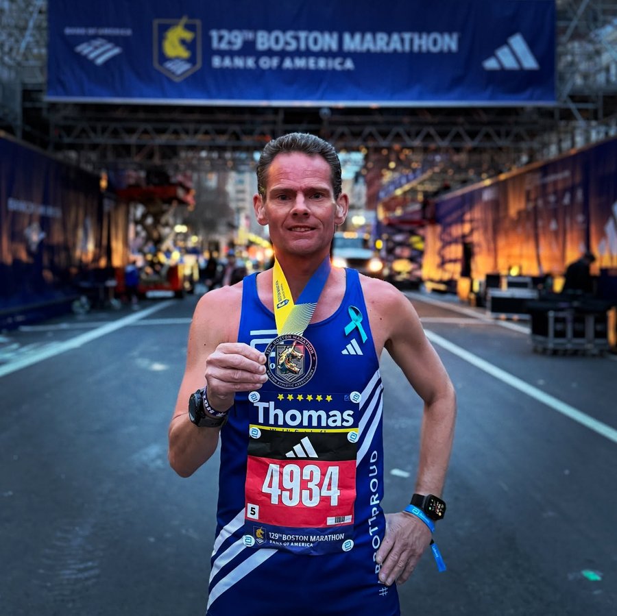 Instagram post by @deafworldrunnertom for Bank of America. Caption reads: [...] unforgettable experience. The 129th Bank of....