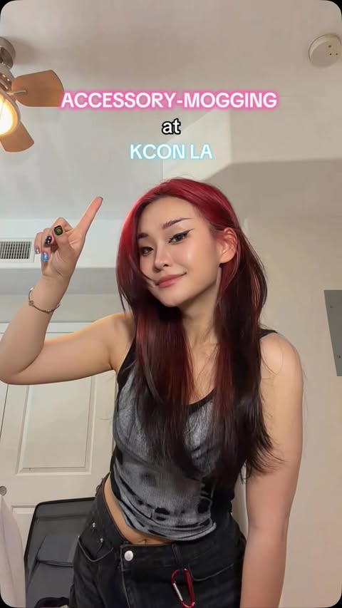 Instagram post by @cocojiew for Loop Earplugs. Caption reads: Accessory mogging @kconusa with @loopearplugs ! .....