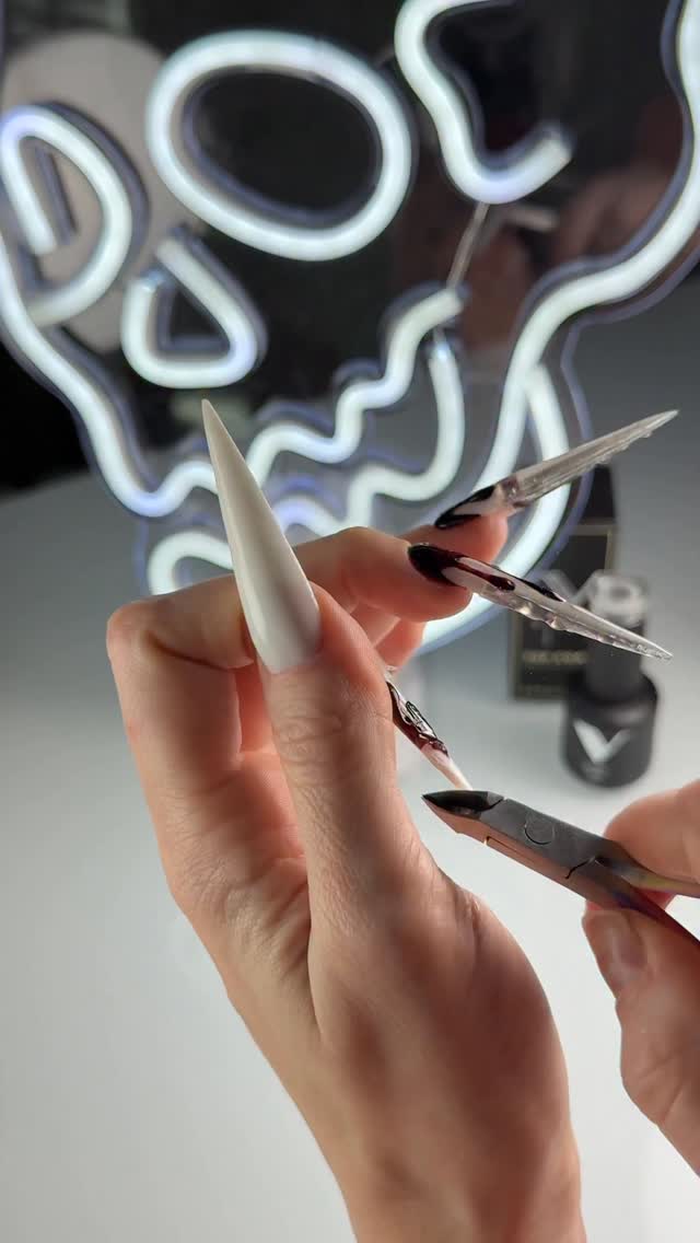 Instagram post by @miralina_nails for VBeautyPure. Caption reads: when in doubt - black stilettos 🔪🖤 

SHOP....