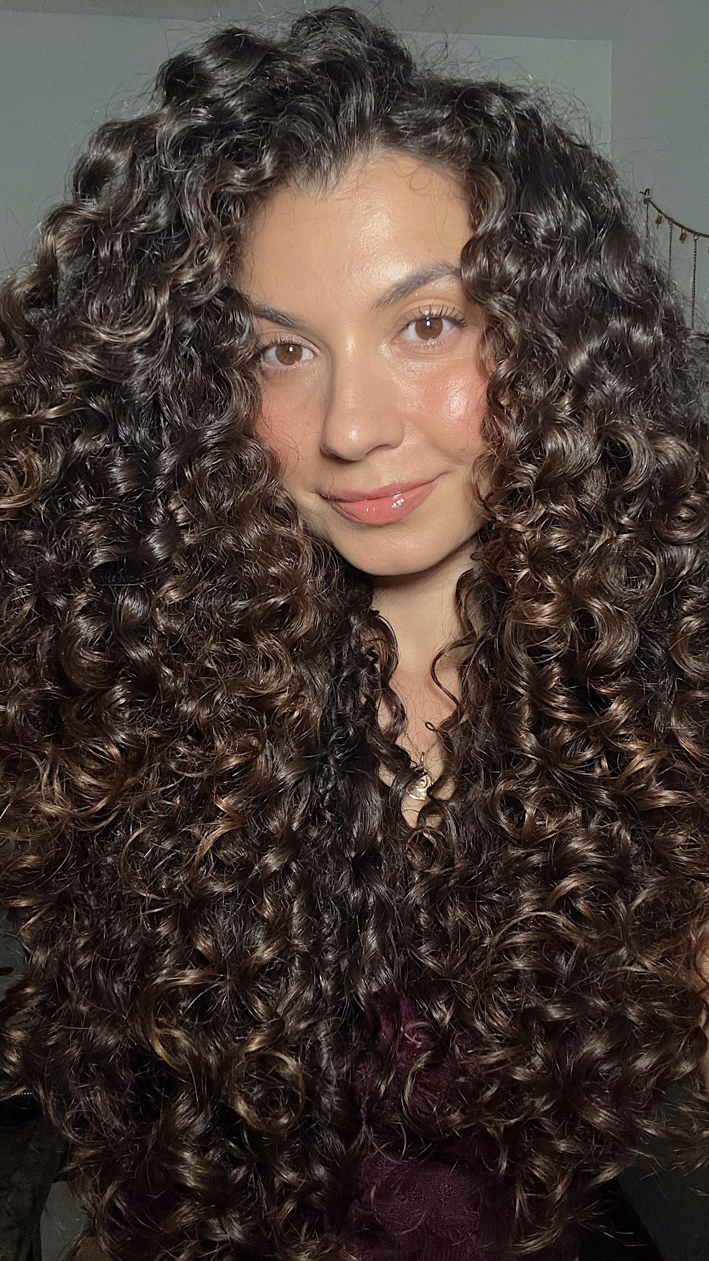 Instagram post by @fris.ee for Ouidad. Caption reads: [...] for later. 

products → 
@isima curl cream....