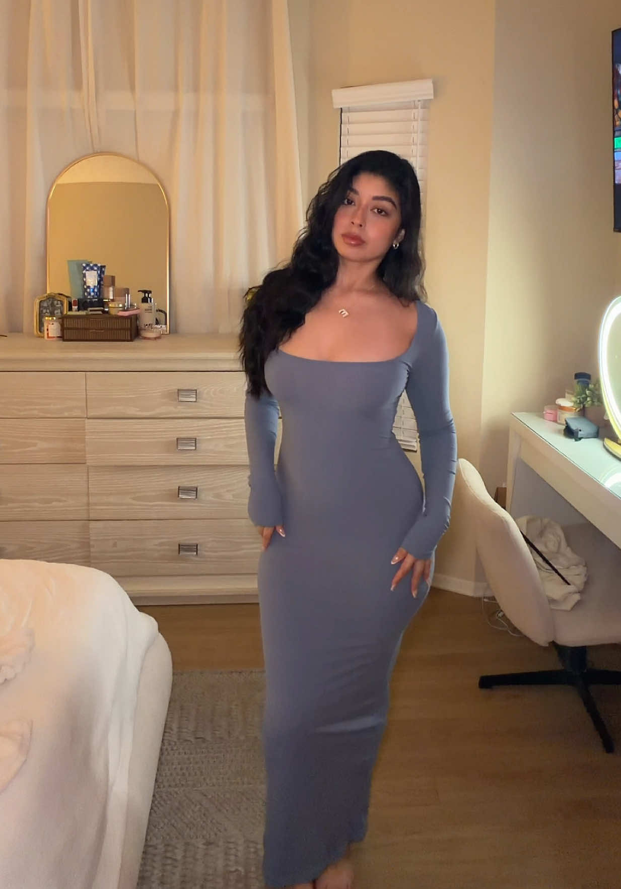 TikTok post by @emelur for PUMIEY. Caption reads: @PUMIEY you ate with this one #maxidress [...].