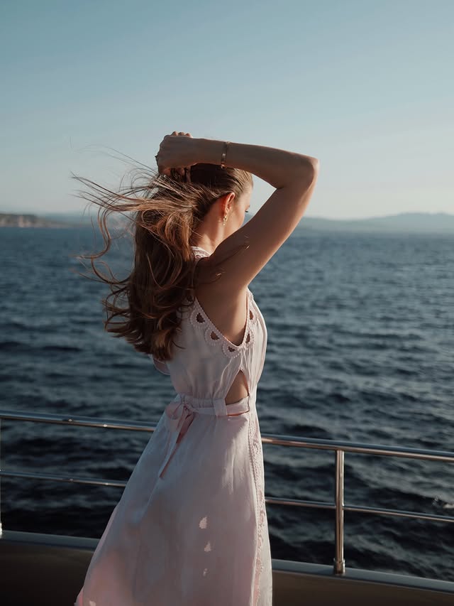 Instagram post by @charlottetolottaleclerc for Sandro Paris. Caption reads: The vibes of this dress: 🐚🌸🎀🌊 @sandroparis....