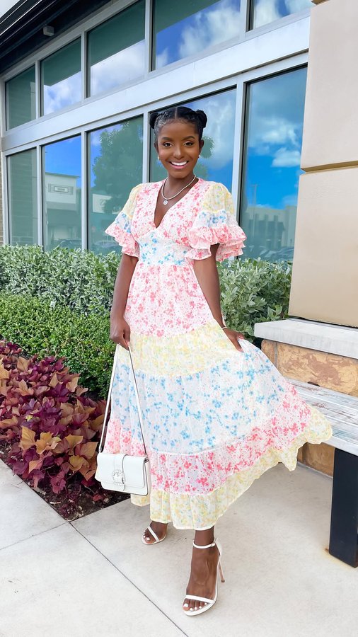 Instagram post by @cammpie for Red Dress. Caption reads: Feminine, Soft & Blossoming! 💗

Last year I was....