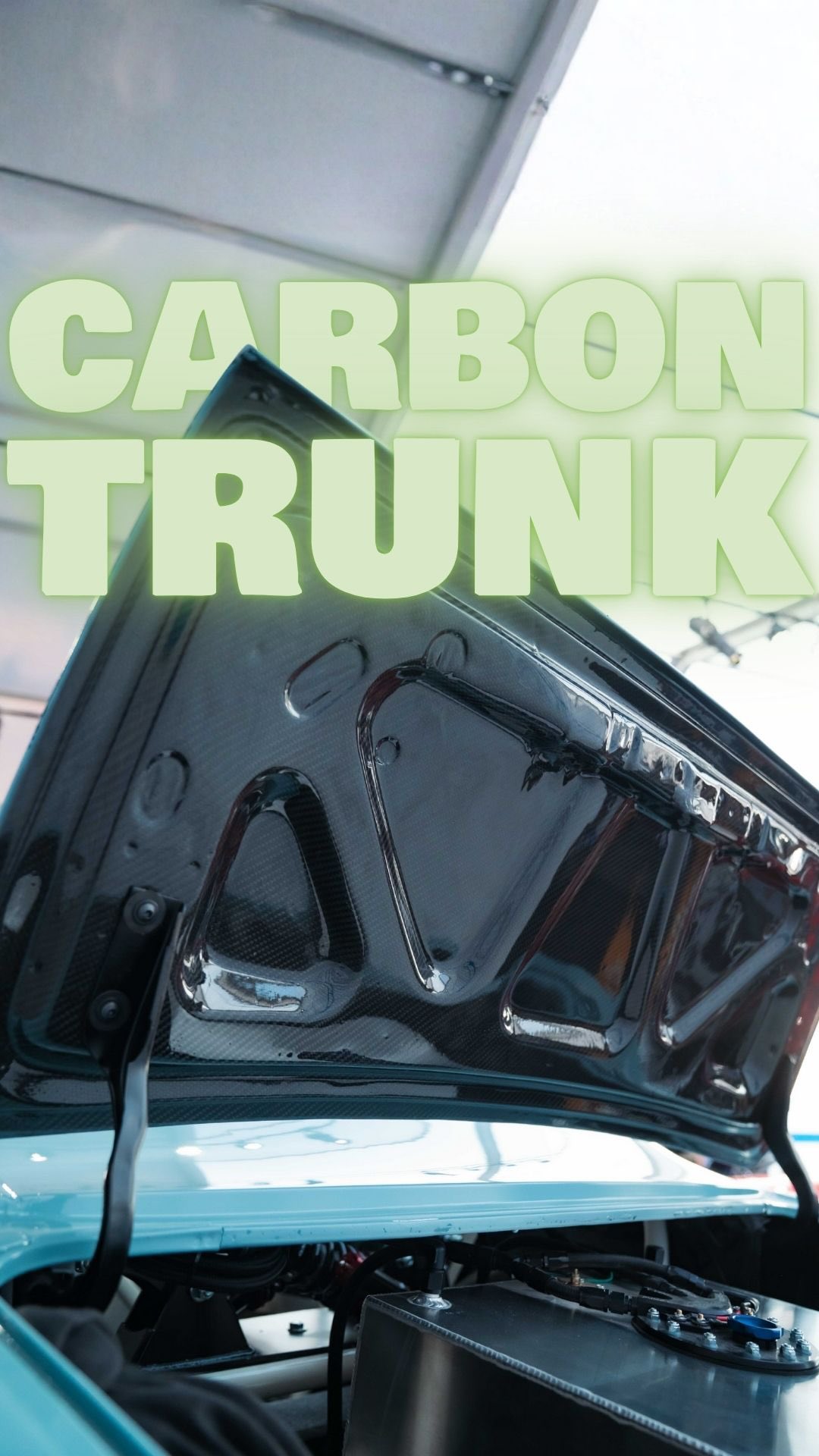 Instagram post by @autometaldirect for Holley. Caption reads: How much do you think this carbon trunk weighs??....