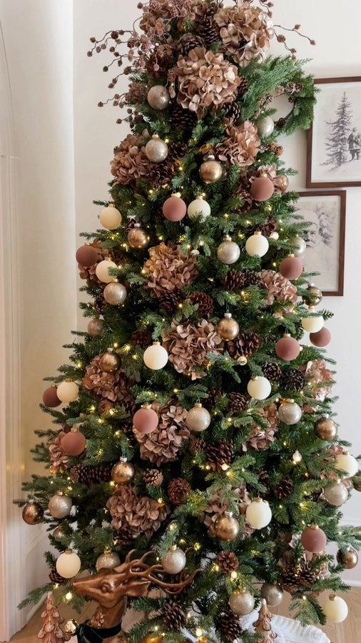 Instagram post by @ashleymariesavage for Michaels Stores. Caption reads: Set up my Christmas tree with me ✨ Comment TREE to....