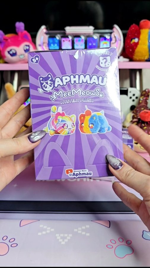 Instagram post by @tanjastoysreview for Bonkers Toys. Caption reads: [AD] 💜 #asmr Unboxing Aphmau Mystery MeeMeows....