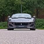 Instagram post by @prettycarsnl for Ferrari. Caption reads: Ferrari Portofino 🐺 I had to share this amazing....