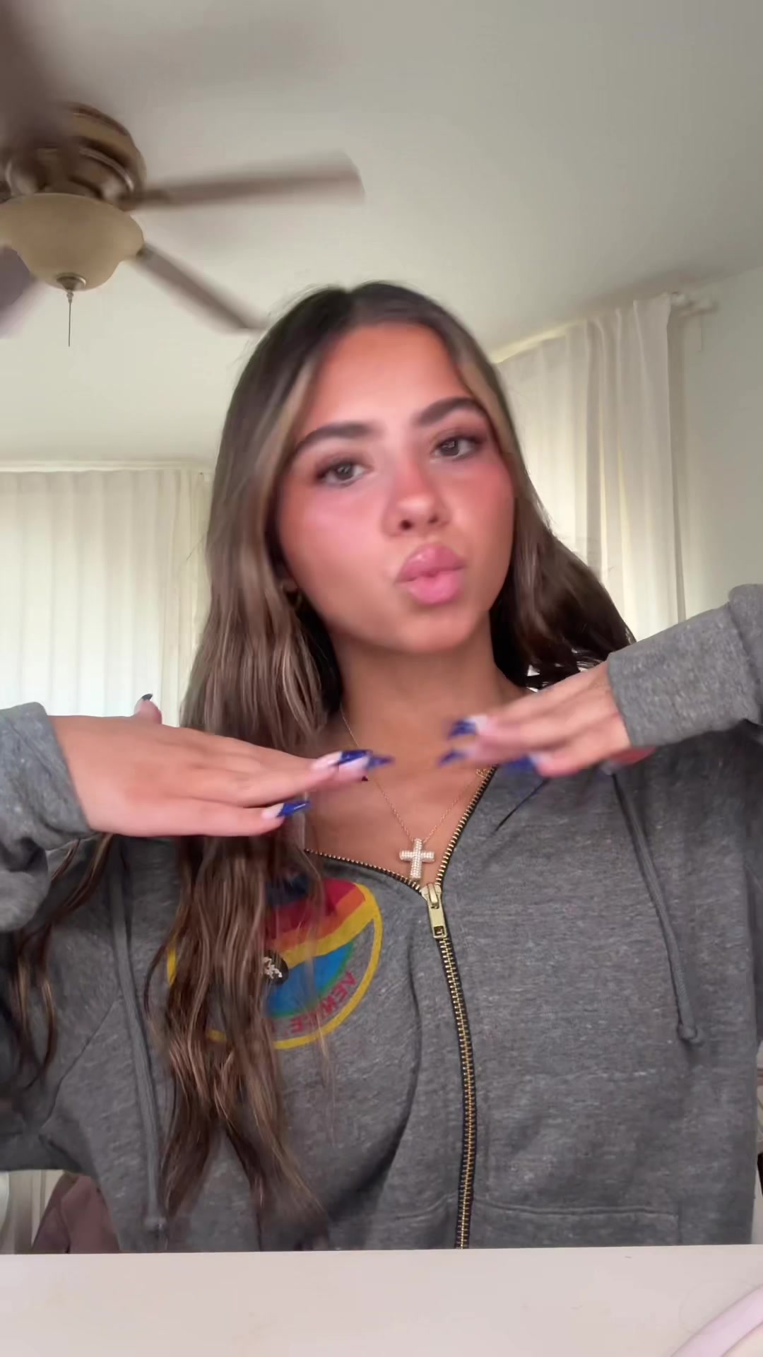 TikTok post by @fasshionfreeak for Too Faced. Caption reads: [...] my natural hair @L’Oréal Paris @Rare Beauty....