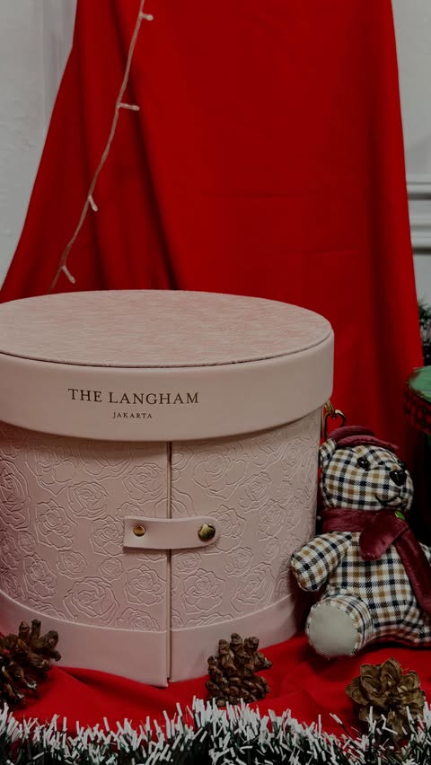 Instagram post by @gabriellaglady for The Langham Hotels & Resorts. Caption reads: Celebrate the season with Langham’s Festive....