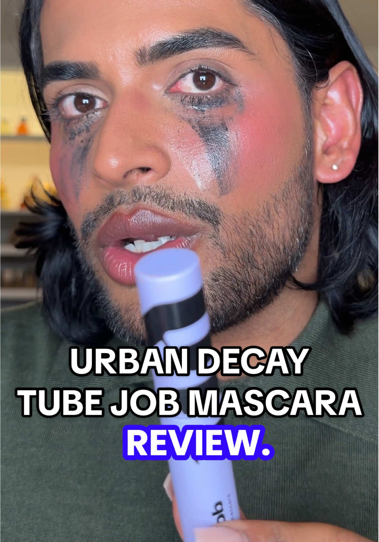 TikTok post by @adityamadiraju for Urban Decay. Caption reads: Review of @Urban Decay Cosmetics Tube Job Mascara....