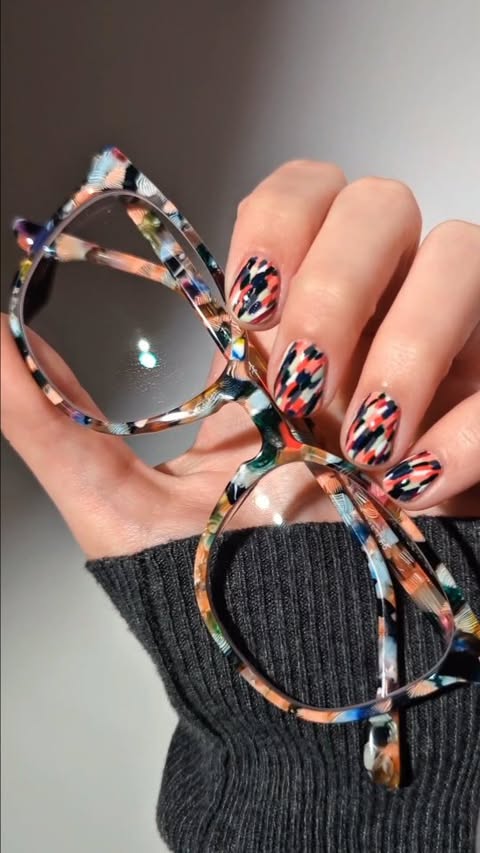 Instagram post by @jackie.shades for Firmoo. Caption reads: *ad* Need some nail inspo? Match your mani to your....