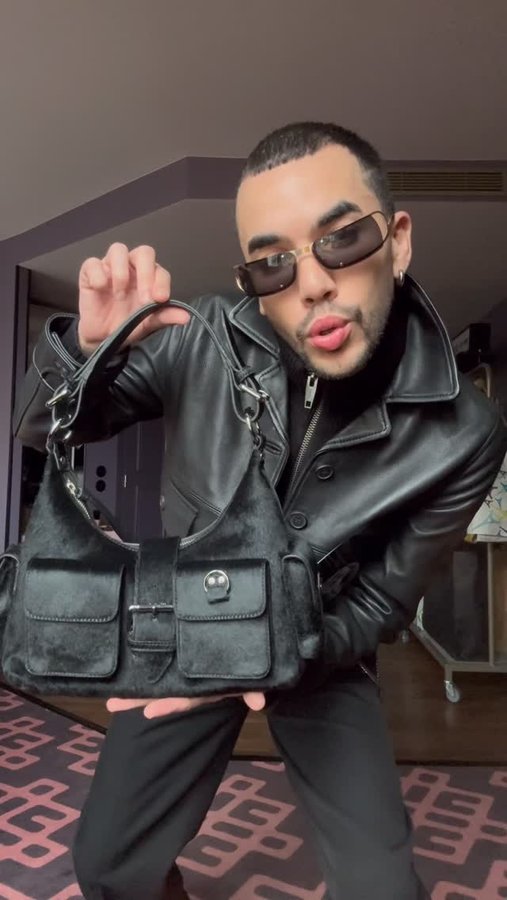 Instagram post by @voguebymalek for The Kooples. Caption reads: ce total look @thekooples omggg 🫰🏻🖤 qu’en....