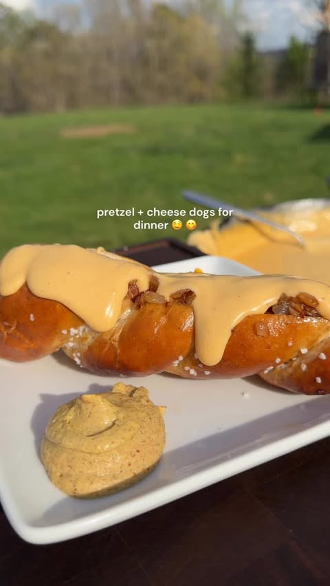 Instagram post by @thebateskitchen for Williams Sonoma. Caption reads: Rich melty cheese, fresh warm pretzel buns,....