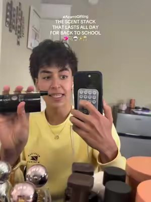 TikTok post by @lifeofshawnkhan for Her Campus. Caption reads: [...] SCHOOL SEASON! 💖👏✨ @azarro__perfume....