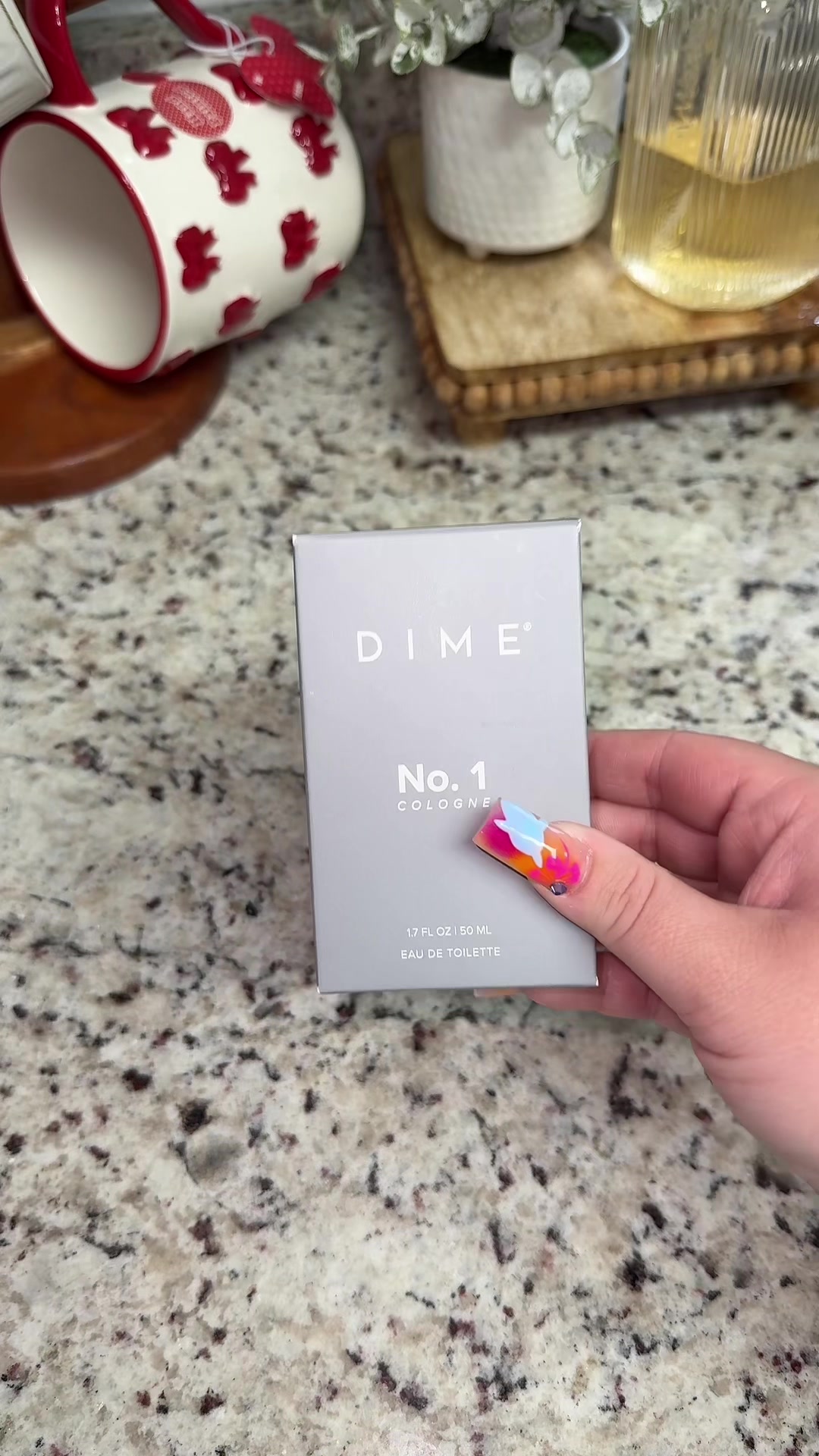TikTok post by @katienicolee1 for DIME Beauty. Caption reads: [...] smells amazing on my hubby! 😩 @DIME Beauty....