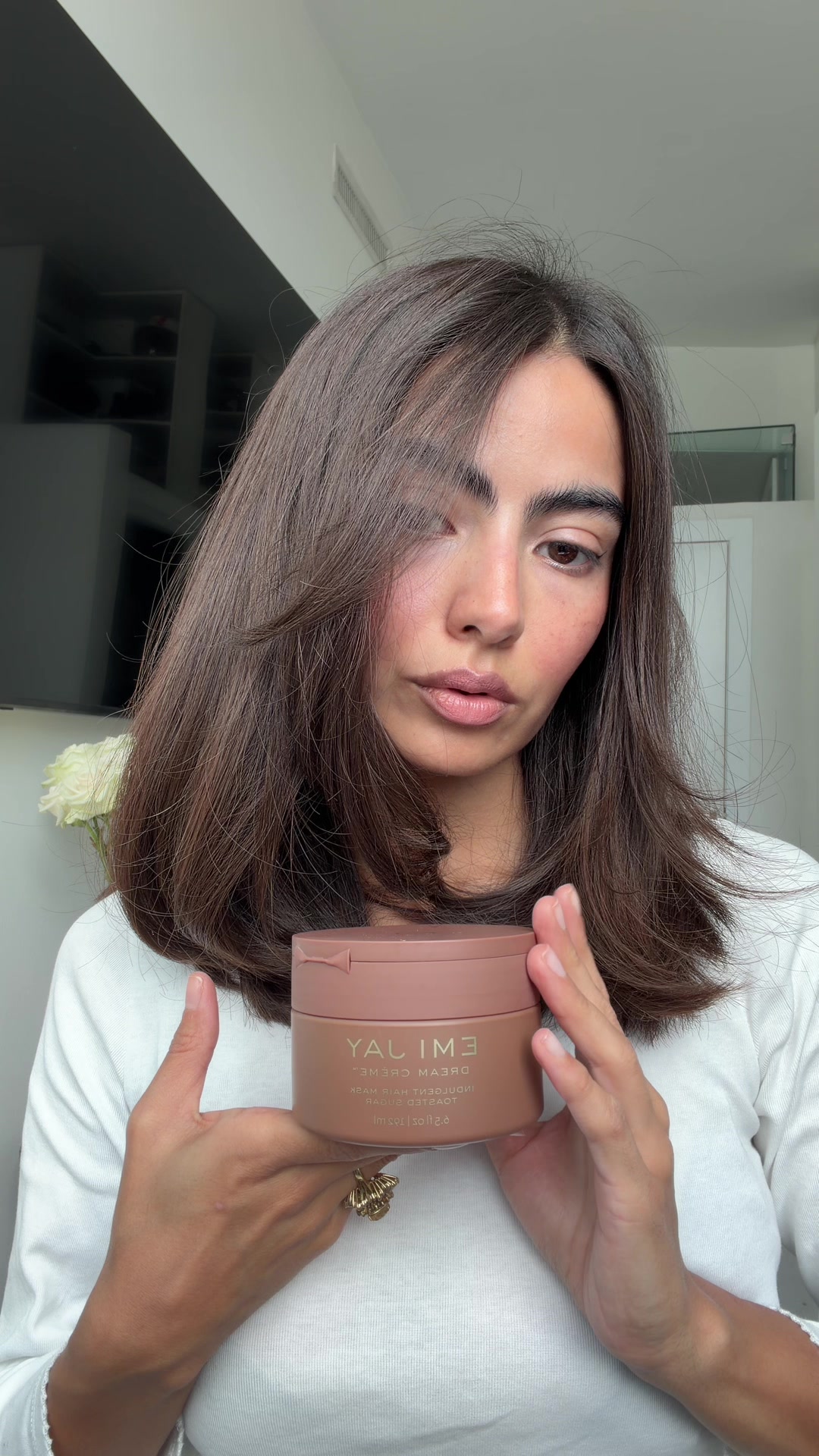 TikTok post by @missmiav for Emi Jay. Caption reads: It’s an Emi Jay Fall🧸🤎 Dream Creme in toasted....