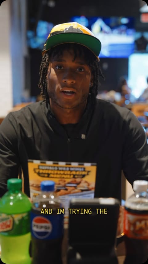Instagram post by @aarongregory_07 for Buffalo Wild Wings. Caption reads: I was born in 2007 so I’m trying Buffalo Wild....