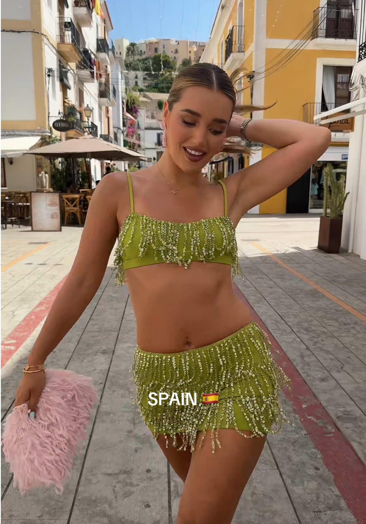 TikTok post by @lucinda for OH POLLY. Caption reads: back on my favourite island with @Oh Polly 🩷 ad.