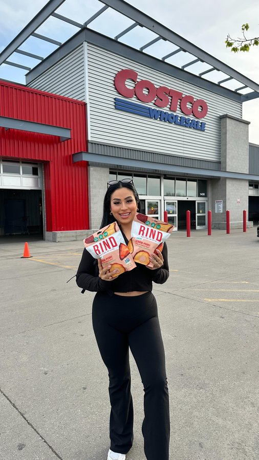 Instagram post by @__itsnallely for RIND Snacks. Caption reads: @rindsnacks Straw-Peary is available for a limited....