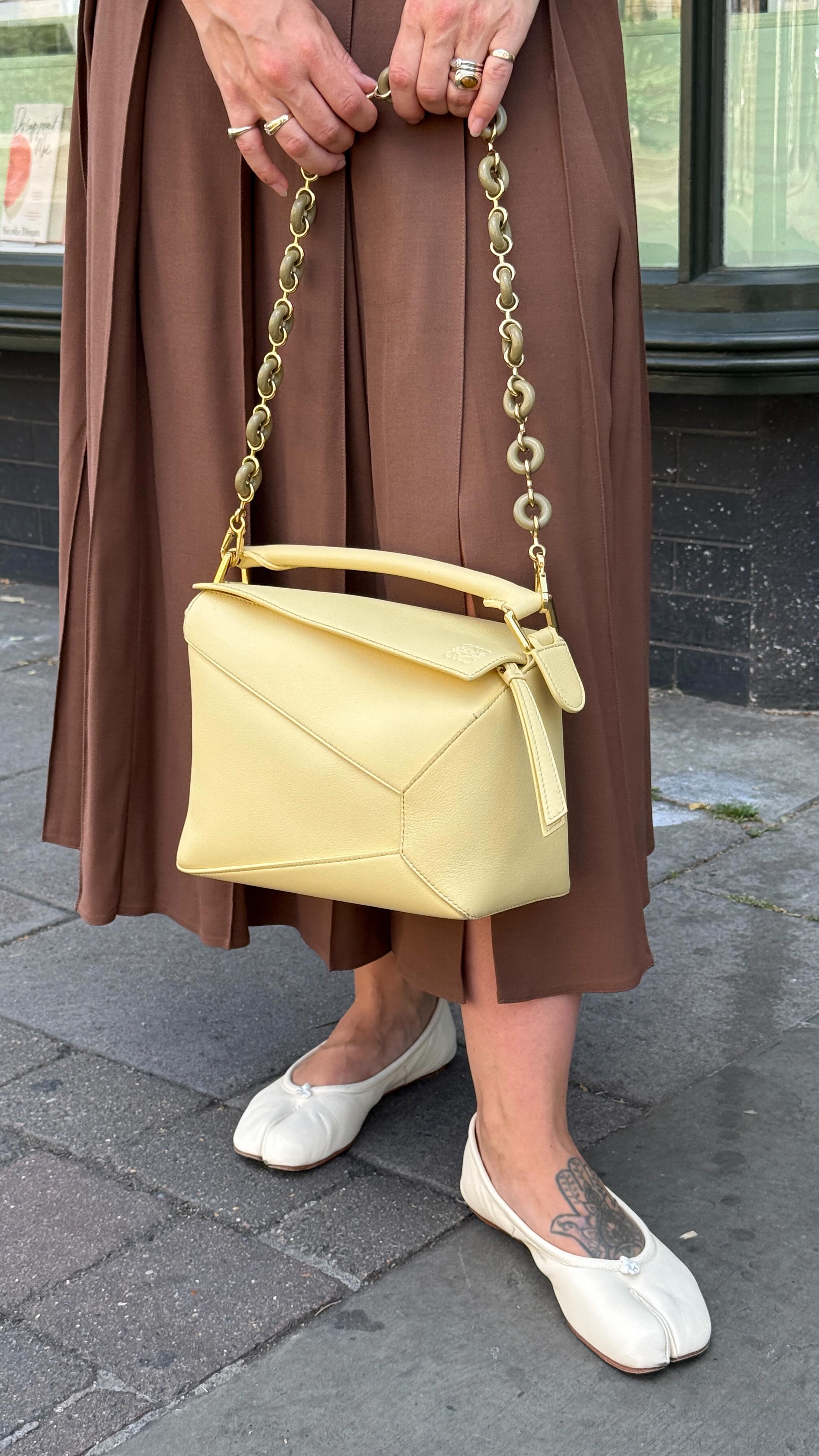 Instagram post by @kerryawalker_ for Monsoon. Caption reads: Steps outside and immediately regrets the long....