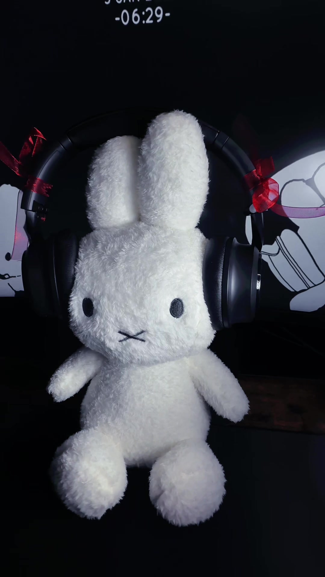 TikTok post by @esppe0n for Wyze. Caption reads: [...] a Jacket 🖤 Cute headphones are from @Wyze....