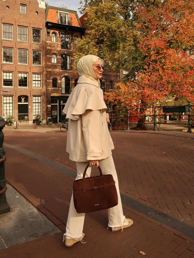 Instagram post by @aybukenurdemirci for Manu Atelier. Caption reads: Postcard from Amsterdam 🍂🍁🏡 @fahhardesign....