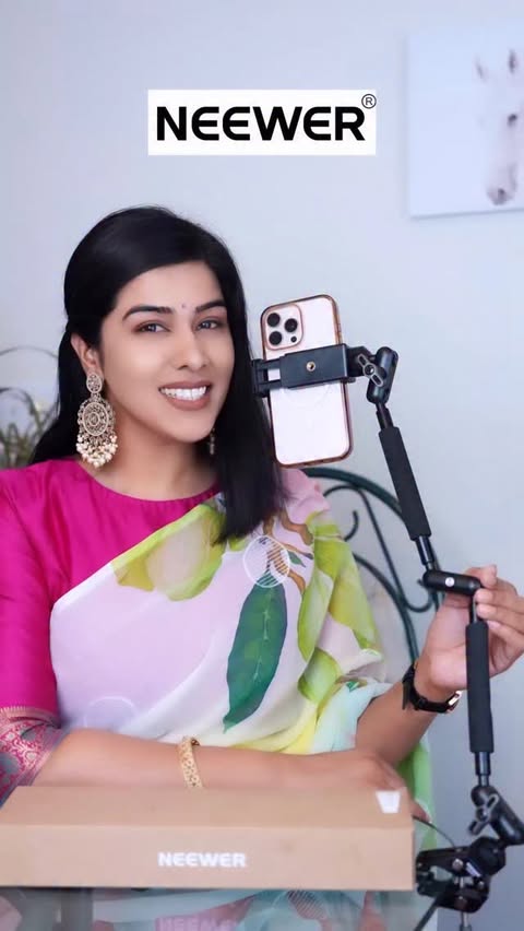 Instagram post by @preetkaurthakurr for NEEWER. Caption reads: Level up your setup with the Neewer UA057 🎬✨ A....