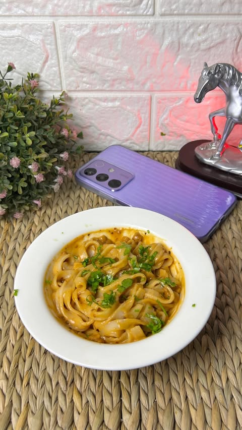 Instagram post by @manjil_dhakal_46 for realme. Caption reads: [...] homemade sauce — all while putting the....