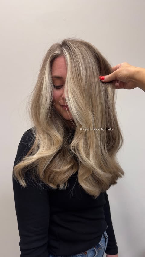 Instagram post by @hairbylisamathews for Framar. Caption reads: Champagne pearl Blonde 🤍✨🥂

First I Lifted to a....