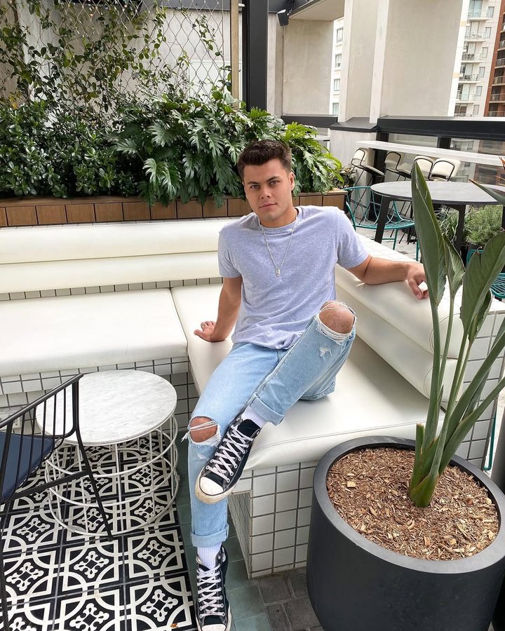 Instagram post by @ethan.hoskins for Abrand Jeans. Caption reads: [...] denim uses up to 90% less water 🌍....