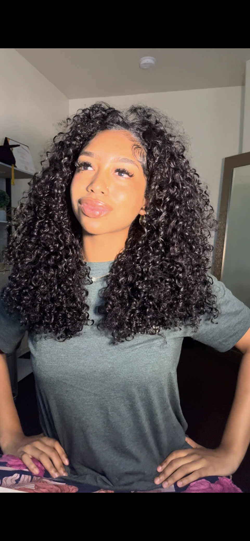 TikTok post by @kaityvee for OQHAIR. Caption reads: Half wigs were the smartest thing I’ve ever gotten....