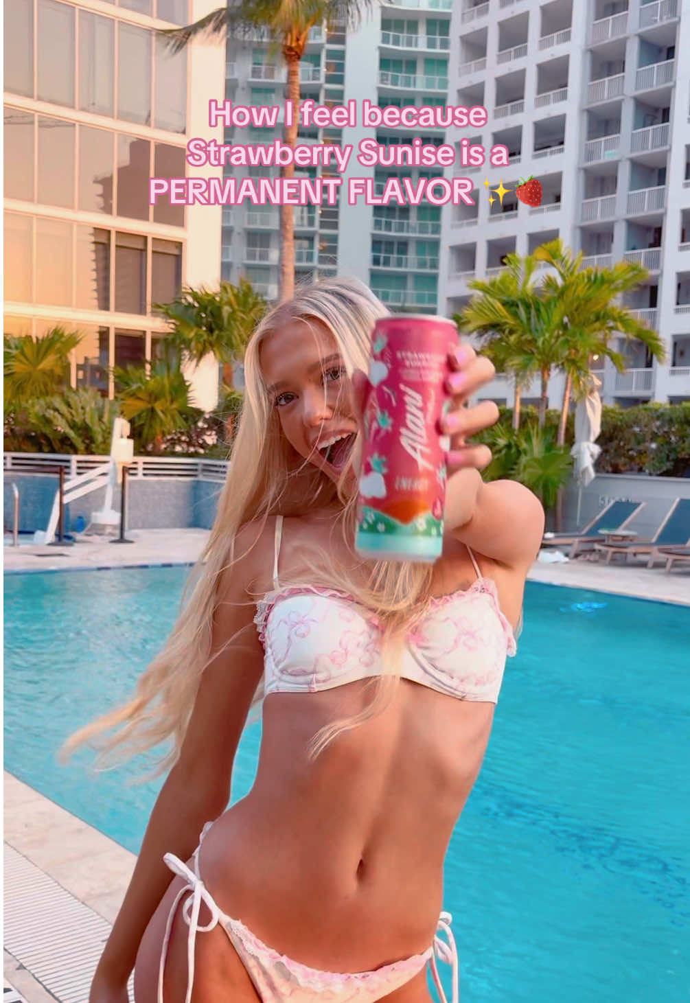 TikTok post by @karlynewberry for Alani Nutrition. Caption reads: [...] is permanent!! ☁️🍓💕 @Alani Nutrition....