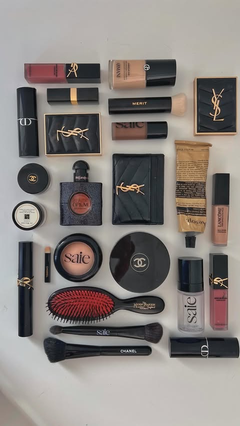 Instagram post by @adarlingspace for Aesop. Caption reads: Luxe girl Flatlay >> #LuminousSilk #GiftedByArmani....