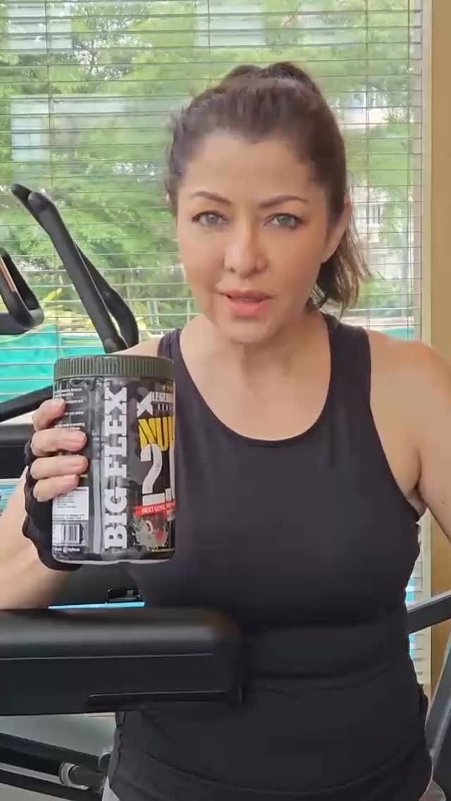 Instagram post by @aditigovitrikar for Big Flex - Sports Nutrition. Caption reads: Unleash the beast within! 
NUKE Pre-Workout isn’t....