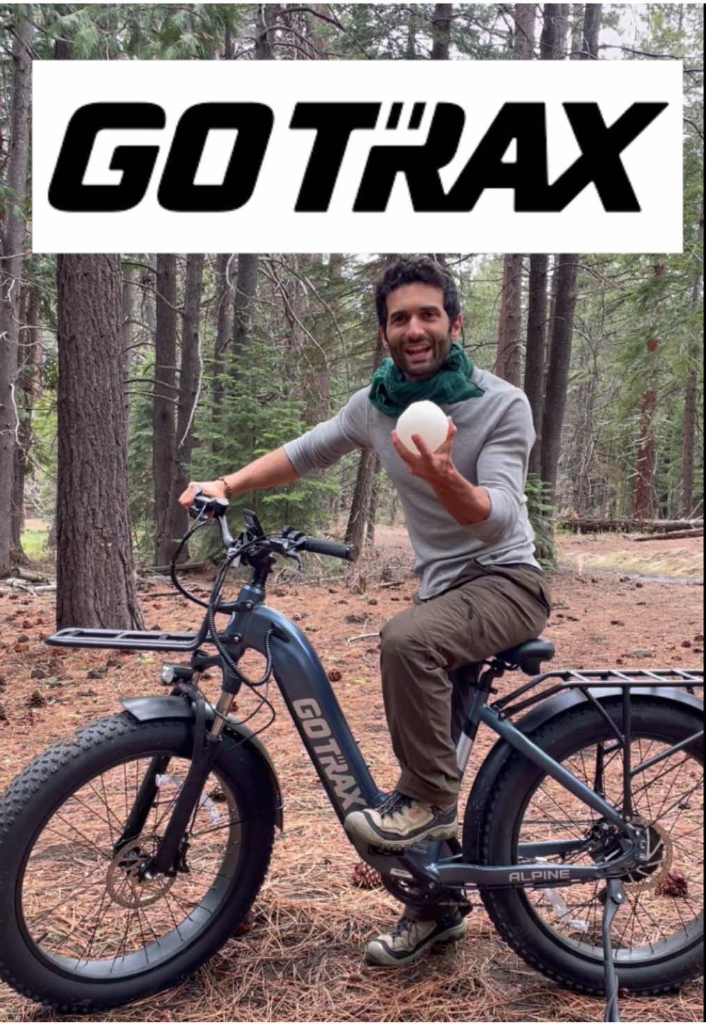 TikTok post by @outdooranthony for Gotrax. Caption reads: Now you can race a Black Bear 🐻 🚲  #gotrax....