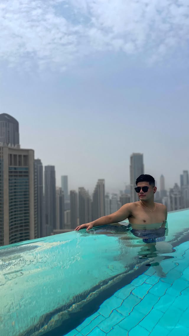 Instagram post by @cedzwolf for Burj Khalifa by Emaar. Caption reads: POV: It’s vacation time 🎉 Enjoy the breathtaking....