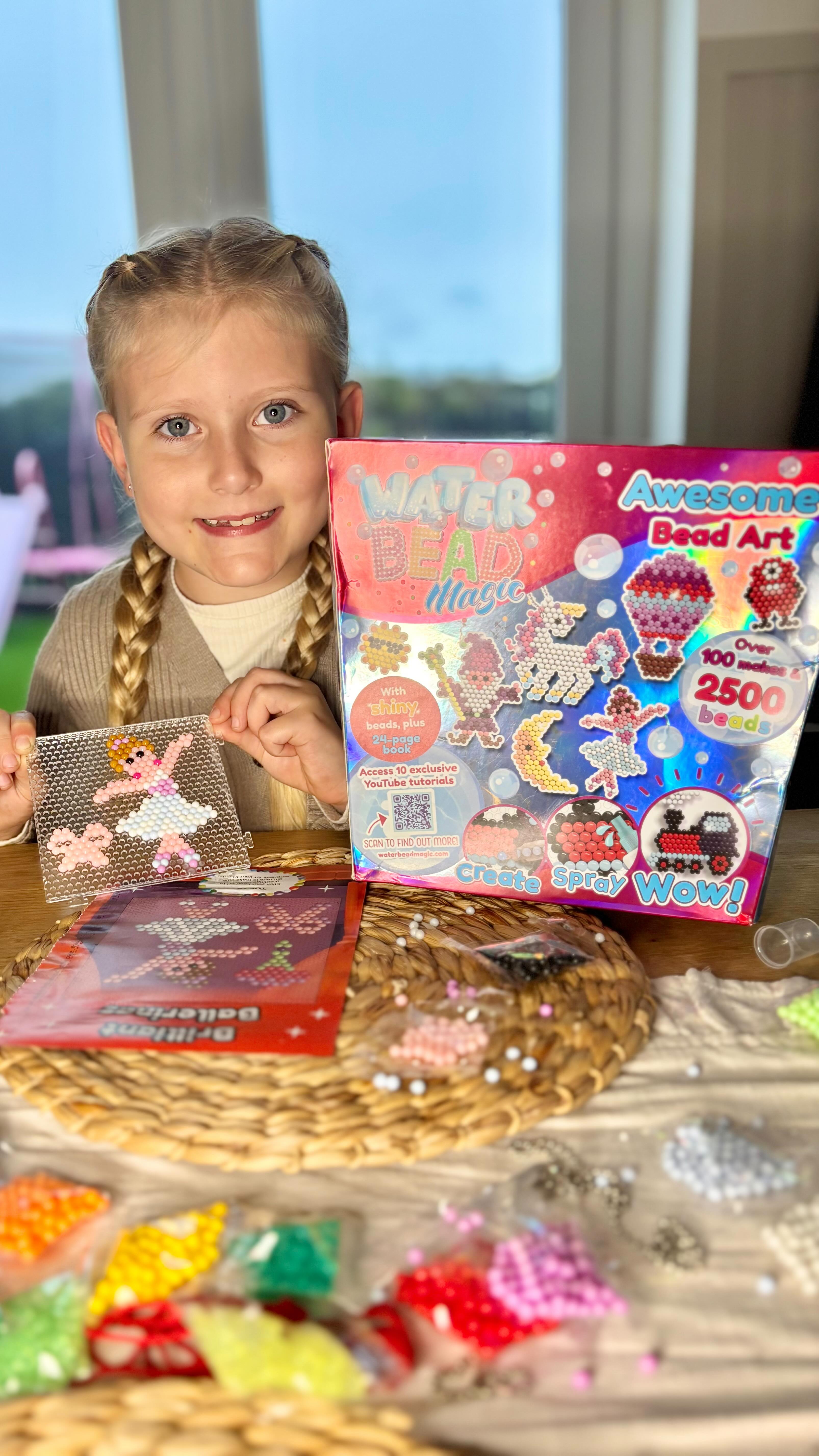 Instagram post by @darlaevelyncalliemeadow for The Entertainer. Caption reads: ☔️ Rainy days made magical! Callie’s been loving....