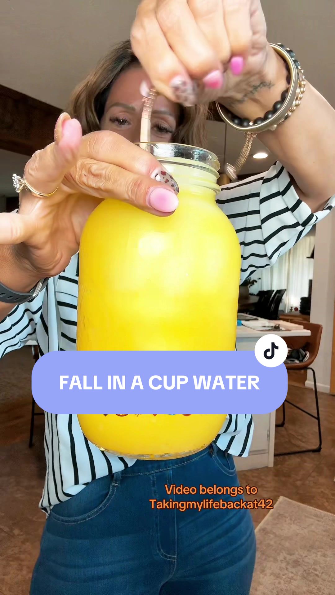 TikTok post by @takingmylifebackat42 for Singles To Go. Caption reads: 🍁🤎🎃🍊🧡 #drinks #water #flavoredwater #fall....