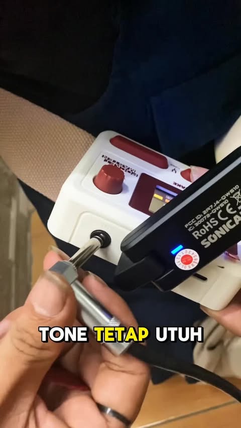 Instagram post by @adot_aldiyana for Tokopedia. Caption reads: Capek sama kabel kusut & noise? Sonicake QWS10....