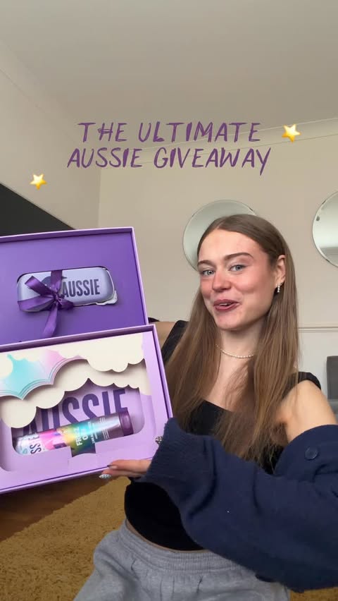 Instagram post by @jas.olivia for Aussie Hair. Caption reads: [...] the ultimate hair care giveaway with....