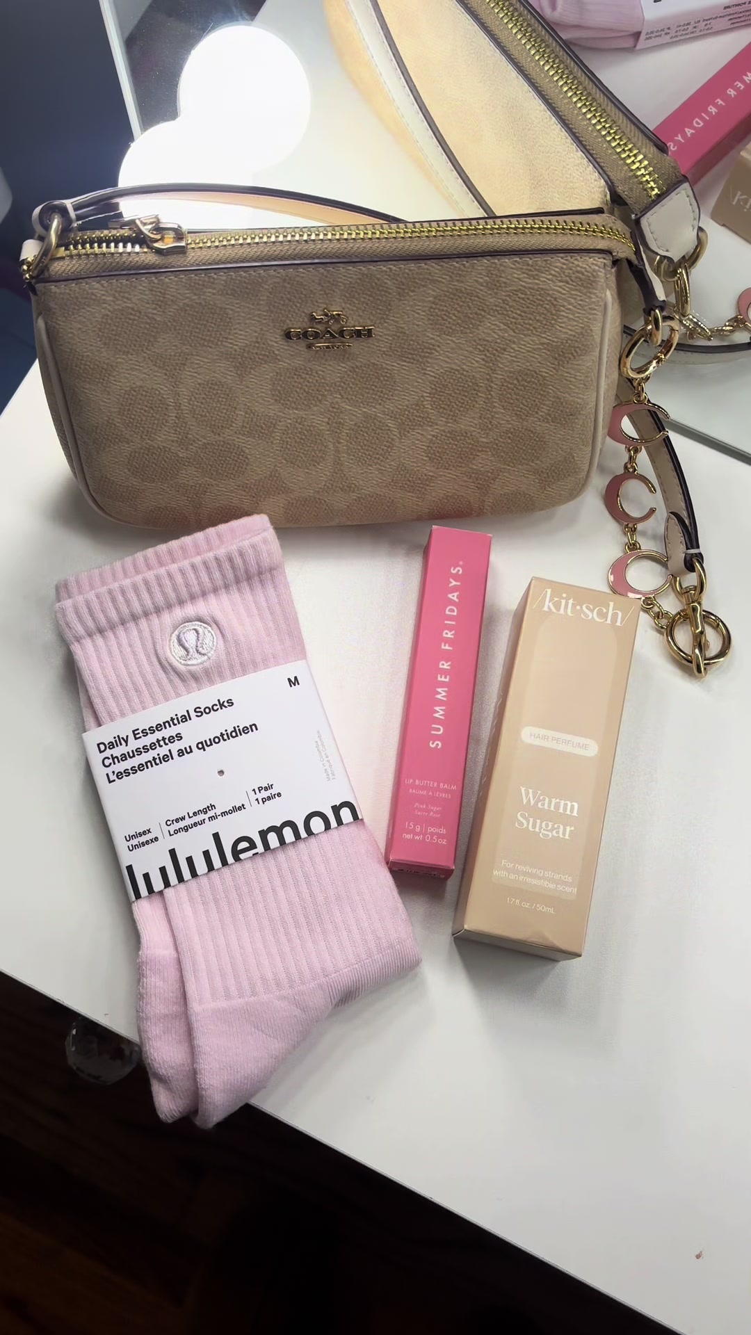 TikTok post by @lovelyyjj for Kitsch. Caption reads: @Kitsch LLC best perfumes 🧸☁️ #kitschhairperfume....