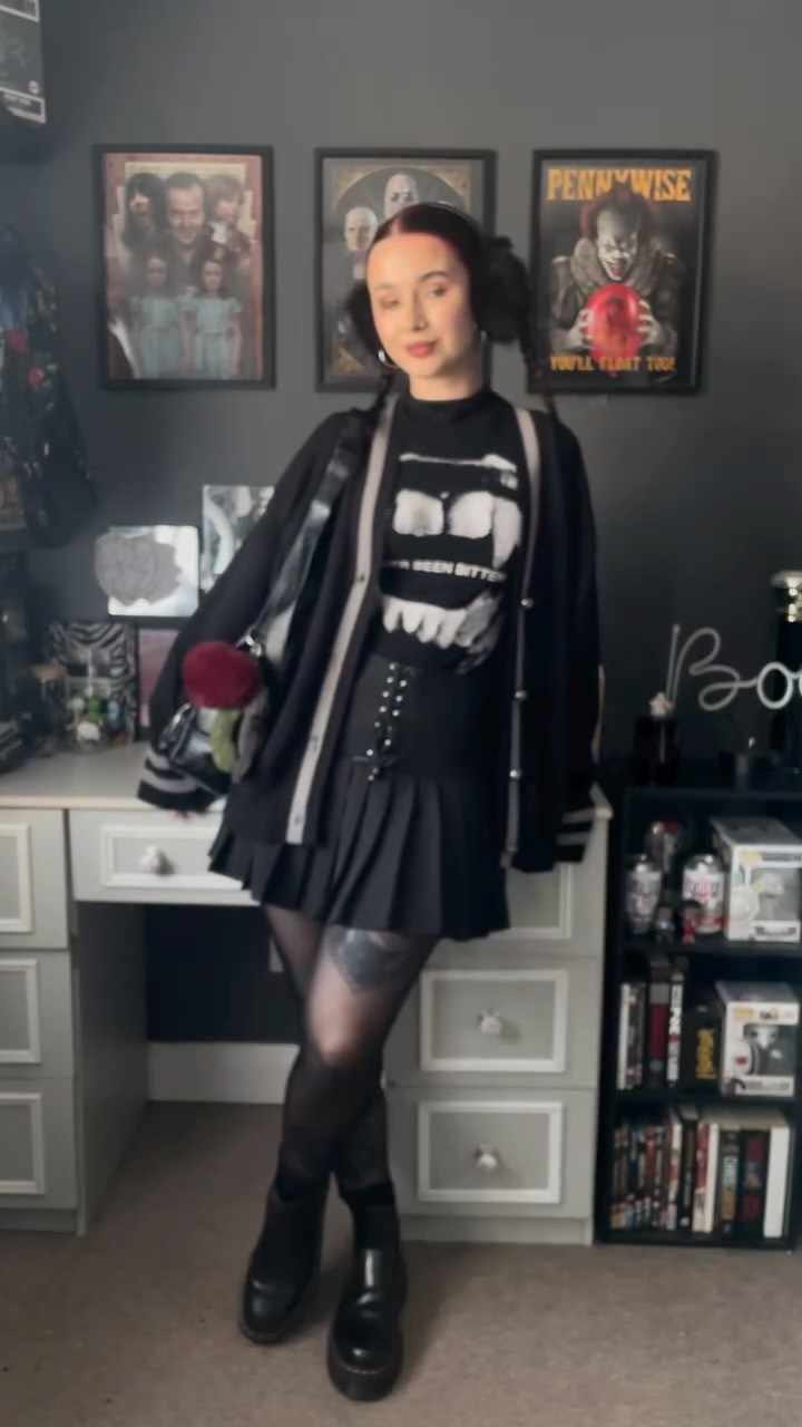 Instagram post by @ariana_magee for Damaged Society. Caption reads: Cosy cardigan season 🥹🖤 Get ready with me using....