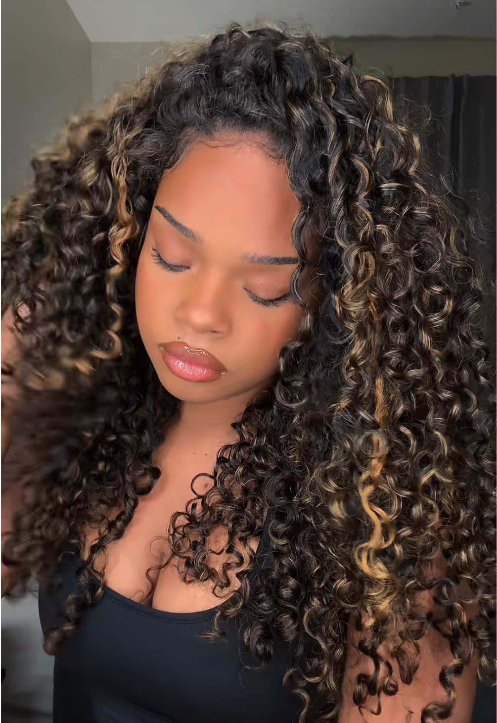 TikTok post by an influencer for OQHAIR. Caption reads: [...] I LOVEEE this wig. Hair from @OQHAIR....