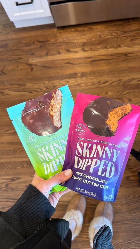 Instagram post by @popstar.katie for SkinnyDipped. Caption reads: [...] my bag? My favorite on the go snack....