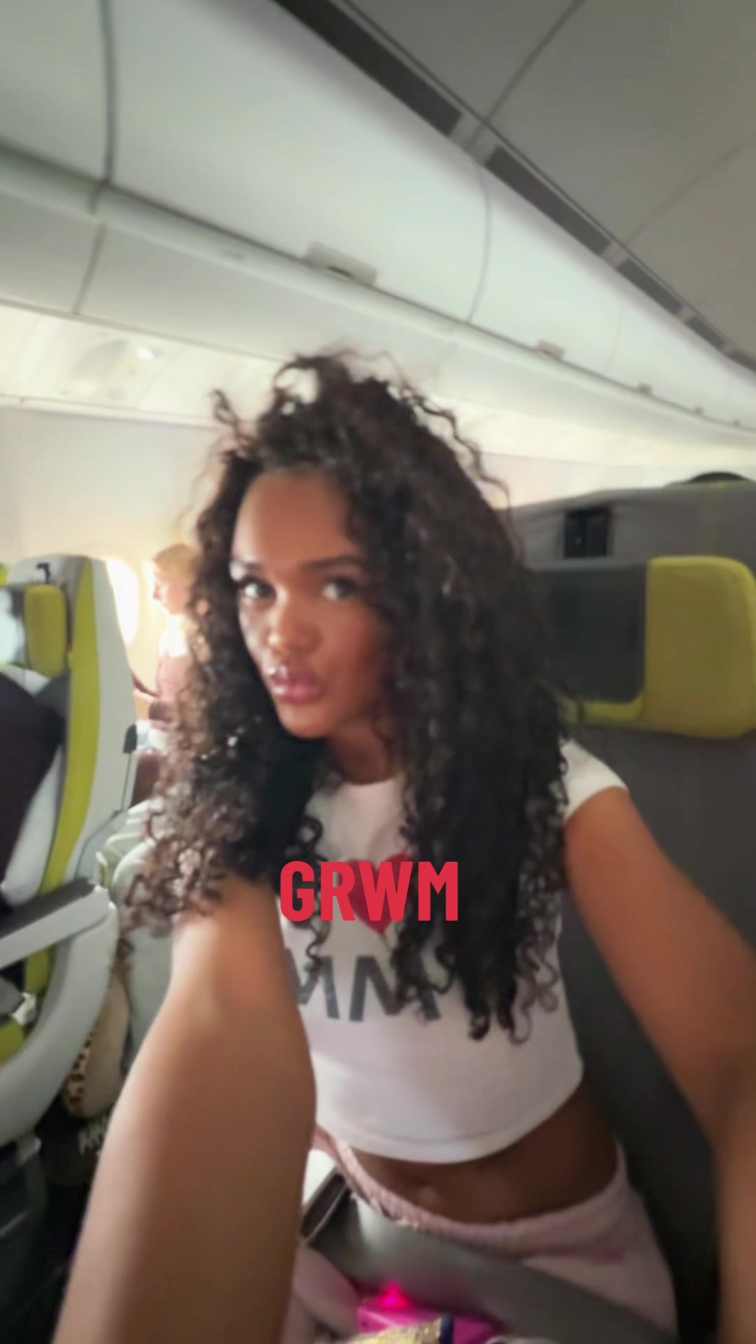 TikTok post by @izaveltkamp for Meet Me There. Caption reads: GRWM to go to miami!!! 🇺🇸🎪🌴🛍️ ✈️ @meet me....